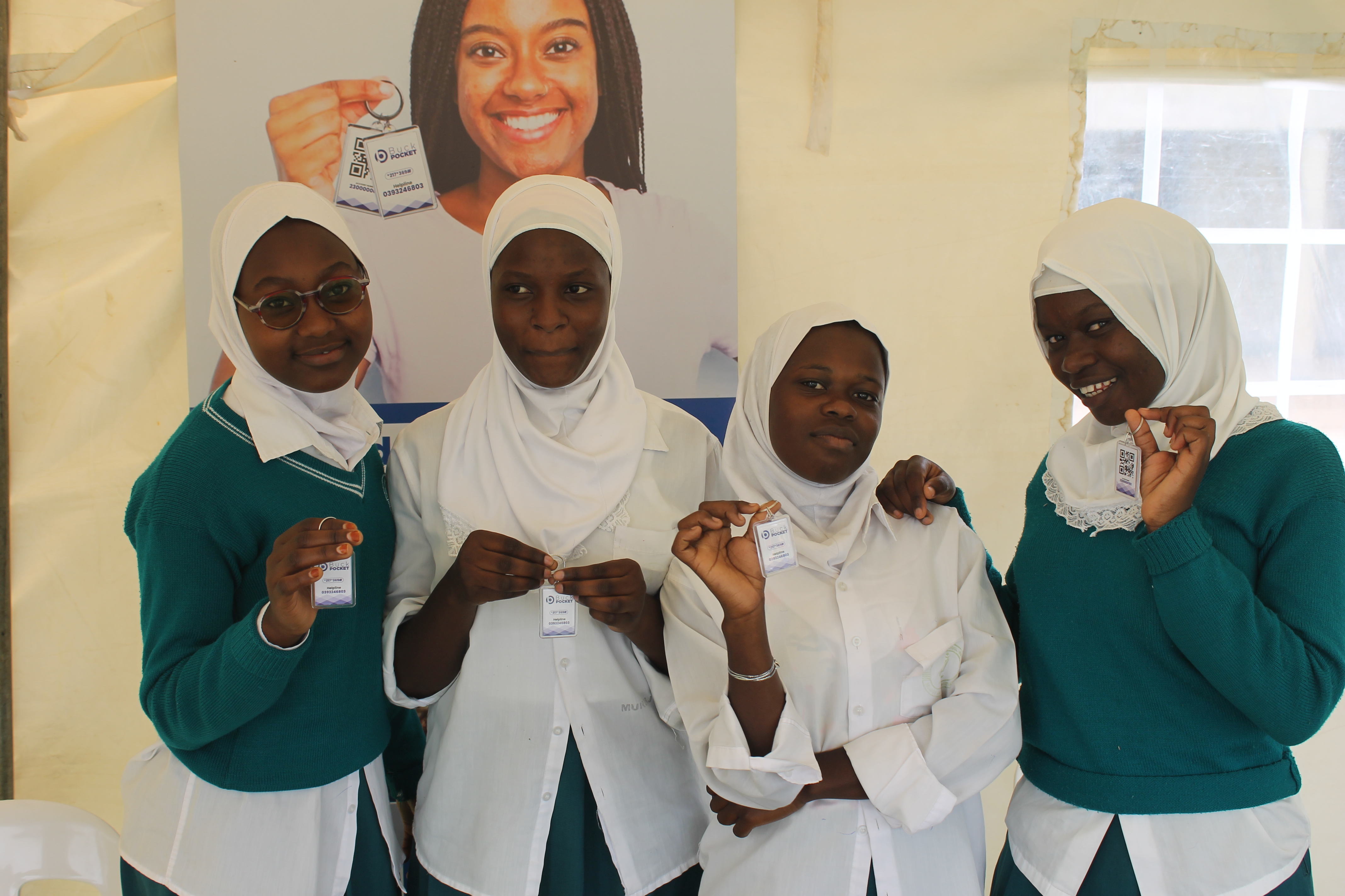 Students holding Buckpocket Keyholders